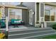 Comfortable covered outdoor seating area is great for outdoor dining and relaxation at 10155 Riverstone Dr, Parker, CO 80134