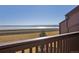 Balcony view overlooking a beautiful lake, making it a serene outdoor space at 7000 W Stetson Pl # 9, Littleton, CO 80123