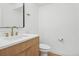 Stylish half bathroom with a modern vanity, brass fixtures, and sleek design at 7000 W Stetson Pl # 9, Littleton, CO 80123