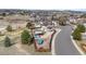 An aerial of a yard and home, showing the shed, car port, boat and other backyard features at 1206 Baldwin Park Cir, Castle Rock, CO 80104