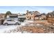 Backyard featuring a large yard, fence, car and a partial view of the house at 1206 Baldwin Park Cir, Castle Rock, CO 80104