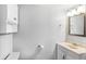 Bright bathroom with a vanity, mirror and toilet that has a fresh, clean design at 1206 Baldwin Park Cir, Castle Rock, CO 80104