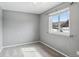 Neutral bedroom with carpet and window allowing for natural light at 1206 Baldwin Park Cir, Castle Rock, CO 80104