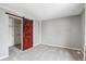 Bedroom showcasing a red barn door leading to a walk-in closet at 1206 Baldwin Park Cir, Castle Rock, CO 80104