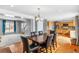 Spacious dining area with hardwood floors flowing to the kitchen; perfect for Gathering gatherings at 1206 Baldwin Park Cir, Castle Rock, CO 80104