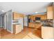 Bright kitchen with wood floors and lots of cabinet space at 1206 Baldwin Park Cir, Castle Rock, CO 80104