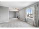 Serene main bedroom with plush carpeting, ample natural light, and neutral decor at 1206 Baldwin Park Cir, Castle Rock, CO 80104