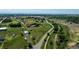 Wide aerial view of the property showcasing the expansive land and location in a suburban neighborhood at 17450 E 14Th Dr, Aurora, CO 80011