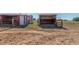 Horse pens, gate and shelters offer a rural charm at 17450 E 14Th Dr, Aurora, CO 80011
