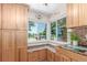 Cozy kitchen nook with natural light and custom cabinets overlooking the backyard at 17450 E 14Th Dr, Aurora, CO 80011