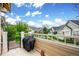 Private patio area featuring a grill with a neighborhood view in the background at 6617 S Reed Way # C, Littleton, CO 80123