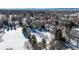 Aerial view of the house and surrounding neighborhood in winter at 3750 S Ogden St, Englewood, CO 80113