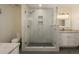 Updated bathroom with a large walk-in shower and modern vanity at 3750 S Ogden St, Englewood, CO 80113