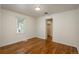 Bright bedroom with hardwood floors and ample closet space at 3750 S Ogden St, Englewood, CO 80113