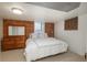 Spacious basement bedroom with wood dresser at 3750 S Ogden St, Englewood, CO 80113