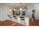 Kitchen with island and white cabinetry at 3750 S Ogden St, Englewood, CO 80113