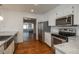 Modern kitchen with stainless steel appliances and granite countertops at 3750 S Ogden St, Englewood, CO 80113