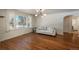 Living room featuring hardwood floors and a large window at 3750 S Ogden St, Englewood, CO 80113