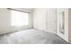 Simple bedroom with neutral carpeting and closet at 9691 Independence Dr, Westminster, CO 80021