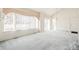 Dining area with large windows and pendant lighting at 9691 Independence Dr, Westminster, CO 80021