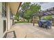 Large backyard with patio, wooden pergola, landscaping and expansive lawn area at 18240 E Mexico Pl, Aurora, CO 80017