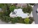 An aerial shot of a home featuring a large deck, beautiful yard, and modern gray roof at 1013 E 130Th Dr, Thornton, CO 80241