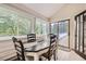 Cozy dining area with plenty of natural light and access to the deck at 1013 E 130Th Dr, Thornton, CO 80241
