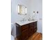 Bathroom with wood vanity and marble countertop at 1000 Collyer St, Longmont, CO 80501