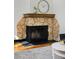 Elegant stone fireplace is a focal point in the living room at 1000 Collyer St, Longmont, CO 80501