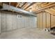 Unfinished basement with concrete walls and exposed ceiling for potential renovations at 2910 S Racine St, Aurora, CO 80014