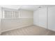 Carpeted bedroom offers great natural light and a closet at 2910 S Racine St, Aurora, CO 80014