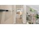 Cozy bedroom with a view of the living room and stairwell at 2910 S Racine St, Aurora, CO 80014