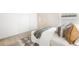 Bright bedroom featuring plush carpeting, a large window and a closet with ample storage space at 2910 S Racine St, Aurora, CO 80014