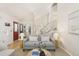 Spacious living room with high ceilings, staircase and modern furnishings at 2910 S Racine St, Aurora, CO 80014