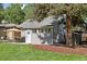 Well-maintained backyard with mature tree at 3976 S Washington St, Englewood, CO 80113