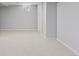 Spacious basement with neutral carpet and paint, ready for customization at 3976 S Washington St, Englewood, CO 80113