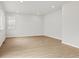 Bright living room features wood flooring and natural light at 559 Homestead Ave, Brighton, CO 80601