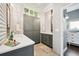 Modern bathroom features dual vanities and stylish decor at 6565 Marshmerry Ln, Evergreen, CO 80439