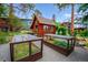 Charming garden beds with protective covers provide the perfect space for growing vegetables and enjoying the outdoors at 6565 Marshmerry Ln, Evergreen, CO 80439