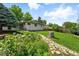 Charming backyard with stone path and inviting seating area at 470 S Queen St, Lakewood, CO 80226
