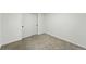 Neutral bedroom featuring carpet and a double-door closet at 470 S Queen St, Lakewood, CO 80226