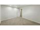 Neutral bedroom featuring carpet and a door to a closet at 470 S Queen St, Lakewood, CO 80226