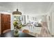 Bright living room with a large window, neutral tones, and stylish decor, creating a welcoming and comfortable space at 470 S Queen St, Lakewood, CO 80226