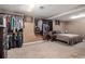 Bedroom with closet organizers and carpeted floor offers plenty of space at 7296 Quivas St, Denver, CO 80221