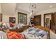 Bright bedroom featuring two twin beds, sloped ceiling, and natural light from the window overlooking an outdoor view at 215 Royal Tiger Rd, Breckenridge, CO 80424