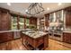 Gourmet kitchen with custom cabinets, granite countertops, and stainless steel appliances at 215 Royal Tiger Rd, Breckenridge, CO 80424