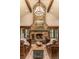 Bright living room featuring a stone fireplace, comfortable seating, and rustic accents at 215 Royal Tiger Rd, Breckenridge, CO 80424