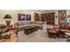 Living area with cozy seating, wooden coffee table and access to the other rooms at 215 Royal Tiger Rd, Breckenridge, CO 80424