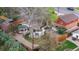Aerial view of backyard with gazebo, mature trees, patio area, and fenced perimeter at 6919 S Valentia St, Centennial, CO 80112