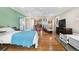 Bright bedroom with hardwood floors and plenty of natural light at 6919 S Valentia St, Centennial, CO 80112